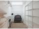 Well-organized walk-in closet with ample shelving, providing plenty of storage space for clothing and accessories at 6251 Tuckaway Cove Ave, Las Vegas, NV 89139