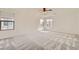 Bright bedroom with many windows offering great natural light, a fan, and neutral colors at 632 Cadence Vista Dr, Henderson, NV 89011