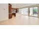 Modern kitchen with stainless steel appliances flowing seamlessly into the spacious living area at 632 Cadence Vista Dr, Henderson, NV 89011