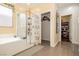 Bathroom featuring a soaking tub and separate shower with glass door at 6409 Dundock Ave, Las Vegas, NV 89122
