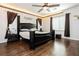 Bedroom featuring wood floors, a ceiling fan, recessed lights and dark furniture at 6409 Dundock Ave, Las Vegas, NV 89122