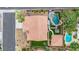 Aerial view of the property highlighting the large lot, pool, outdoor structures, and pristine landscaping at 7211 Heggie Ave, Las Vegas, NV 89131