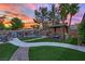 Serene backyard oasis featuring a pool, spa, gazebo and lush landscaping at 7211 Heggie Ave, Las Vegas, NV 89131