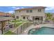 Backyard featuring a pool, gazebo, and rock accents, fenced for privacy, and designed for entertaining at 7211 Heggie Ave, Las Vegas, NV 89131