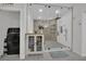 Elegant bathroom featuring a glass enclosed shower with rainfall shower head and modern fixtures at 7211 Heggie Ave, Las Vegas, NV 89131