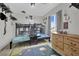Bedroom features bunkbeds, a natural wood dresser, and decorative shelves at 7211 Heggie Ave, Las Vegas, NV 89131