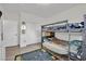 Cozy bedroom with bunk beds, and storage, perfect for children or guests at 7211 Heggie Ave, Las Vegas, NV 89131