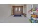Welcoming front entrance with double doors, decorative accents and flower decor at 7211 Heggie Ave, Las Vegas, NV 89131