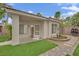 Charming guest house with covered porch and landscaped surroundings at 7211 Heggie Ave, Las Vegas, NV 89131