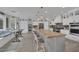 Spacious kitchen with large island, white cabinets, and stainless steel appliances at 7211 Heggie Ave, Las Vegas, NV 89131