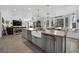 Open-concept living area with large island and breakfast nook in the background at 7211 Heggie Ave, Las Vegas, NV 89131