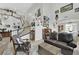 Spacious living room with high ceilings, staircase, wood-look floors, and comfortable seating area at 7211 Heggie Ave, Las Vegas, NV 89131