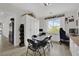 Well-lit office area with built-in desk, cabinets, and natural light from the window at 7211 Heggie Ave, Las Vegas, NV 89131