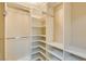 Spacious closet featuring shelving and hanging racks for optimal organization and storage at 7217 Mission Hills Dr, Las Vegas, NV 89113