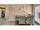 Dining area with backyard access and view of the kitchen at 7217 Mission Hills Dr, Las Vegas, NV 89113