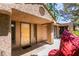 Inviting front entrance with stucco detail and shade, creating a warm welcome to the home at 7217 Mission Hills Dr, Las Vegas, NV 89113