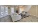 Inviting living room showcasing ample natural light, contemporary furnishings, and stylish decor at 7217 Mission Hills Dr, Las Vegas, NV 89113