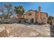 Home with a spacious backyard and block wall fencing at 725 Weatherstone Dr, Las Vegas, NV 89110