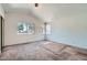 Bright bedroom with large windows providing ample natural light at 725 Weatherstone Dr, Las Vegas, NV 89110