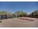 Outdoor basketball court with smooth concrete surface and well-maintained hoops and lines at 10220 Adobe Mountain St, Las Vegas, NV 89178
