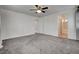 Spacious bedroom features neutral carpet and ensuite bathroom at 10220 Adobe Mountain St, Las Vegas, NV 89178