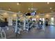Spacious gym with modern equipment, including treadmills, weight machines, and free weights at 10220 Adobe Mountain St, Las Vegas, NV 89178