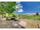 Picturesque backyard view with a paver patio overlooking the golf course at 10562 Cerotto Ln, Las Vegas, NV 89135
