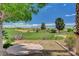 Stunning golf course view from this backyard with desert plants and landscaping at 10562 Cerotto Ln, Las Vegas, NV 89135