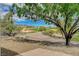 Beautiful backyard view of the golf course with mountain views in the distance at 10562 Cerotto Ln, Las Vegas, NV 89135