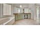 Spacious bathroom featuring dual vanities, a large soaking tub, and ample counter space at 10562 Cerotto Ln, Las Vegas, NV 89135