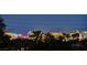 Striking city skyline view showing the High Roller and surrounding resorts at night at 10562 Cerotto Ln, Las Vegas, NV 89135