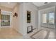 Inviting entryway with tiled floor, decorative accents, and natural light from front doors at 10562 Cerotto Ln, Las Vegas, NV 89135