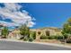 Charming single-story home with manicured landscaping, a two-car garage, and a welcoming facade at 10562 Cerotto Ln, Las Vegas, NV 89135