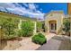 Beautiful single-story home featuring desert landscaping, walkway, and a charming front entrance at 10562 Cerotto Ln, Las Vegas, NV 89135