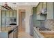 Beautiful kitchen featuring stainless steel appliances, stone countertops, and ample cabinet space at 10562 Cerotto Ln, Las Vegas, NV 89135