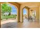 Spacious covered patio offering seamless indoor-outdoor living with serene golf course scenery at 10562 Cerotto Ln, Las Vegas, NV 89135