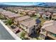 An aerial view of the home in a well-planned community with mountain views at 1114 Junipine Ave, North Las Vegas, NV 89081