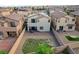 An aerial view of the backyard with a patio, seating, and landscaping, great for entertaining at 1114 Junipine Ave, North Las Vegas, NV 89081