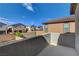 Cozy balcony showcasing views of neighboring homes under a beautiful blue sky at 1114 Junipine Ave, North Las Vegas, NV 89081