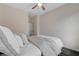 Comfortable bedroom with plush carpeting, a ceiling fan and neutral colors for a relaxing ambiance at 1114 Junipine Ave, North Las Vegas, NV 89081
