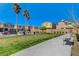 Community park features benches, green space, and trees between rows of suburban homes at 1114 Junipine Ave, North Las Vegas, NV 89081