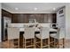 Well-equipped kitchen with breakfast bar seating, sleek countertops, and ample cabinet space at 1114 Junipine Ave, North Las Vegas, NV 89081