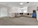 Upstairs loft area with a comfortable sectional sofa and game console at 1114 Junipine Ave, North Las Vegas, NV 89081
