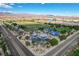 Aerial view of a neighborhood park with walking trails, playground, and open green space at 1114 Junipine Ave, North Las Vegas, NV 89081