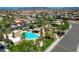 Aerial view of the community featuring a pool, recreation area, and lush landscaping at 130 Twin Towers Ave, Las Vegas, NV 89123