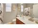 Bathroom featuring a white vanity, a toilet and a shower with curtain at 130 Twin Towers Ave, Las Vegas, NV 89123