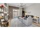 Inviting living room with stylish decor, wood floors, and a sliding door to the outside at 130 Twin Towers Ave, Las Vegas, NV 89123