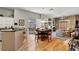 Open concept living and dining area with wood floors and natural light at 130 Twin Towers Ave, Las Vegas, NV 89123