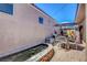Peaceful backyard pond and outside eating area, great for relaxing outdoors at 130 Twin Towers Ave, Las Vegas, NV 89123