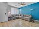 Living room with tiled floors, ceiling fan, and natural light at 1316 Oak Village Ave, Las Vegas, NV 89183